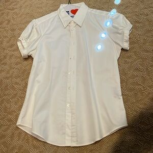 Woman’s white short sleeve blouse